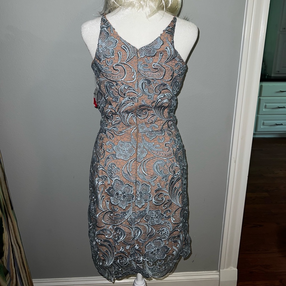 Dress The Population,Never worn still has tags on it. Bought from Newman Marcus.